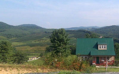 Front view of cabin and scenery