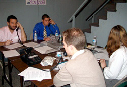 Volunteers work the phones